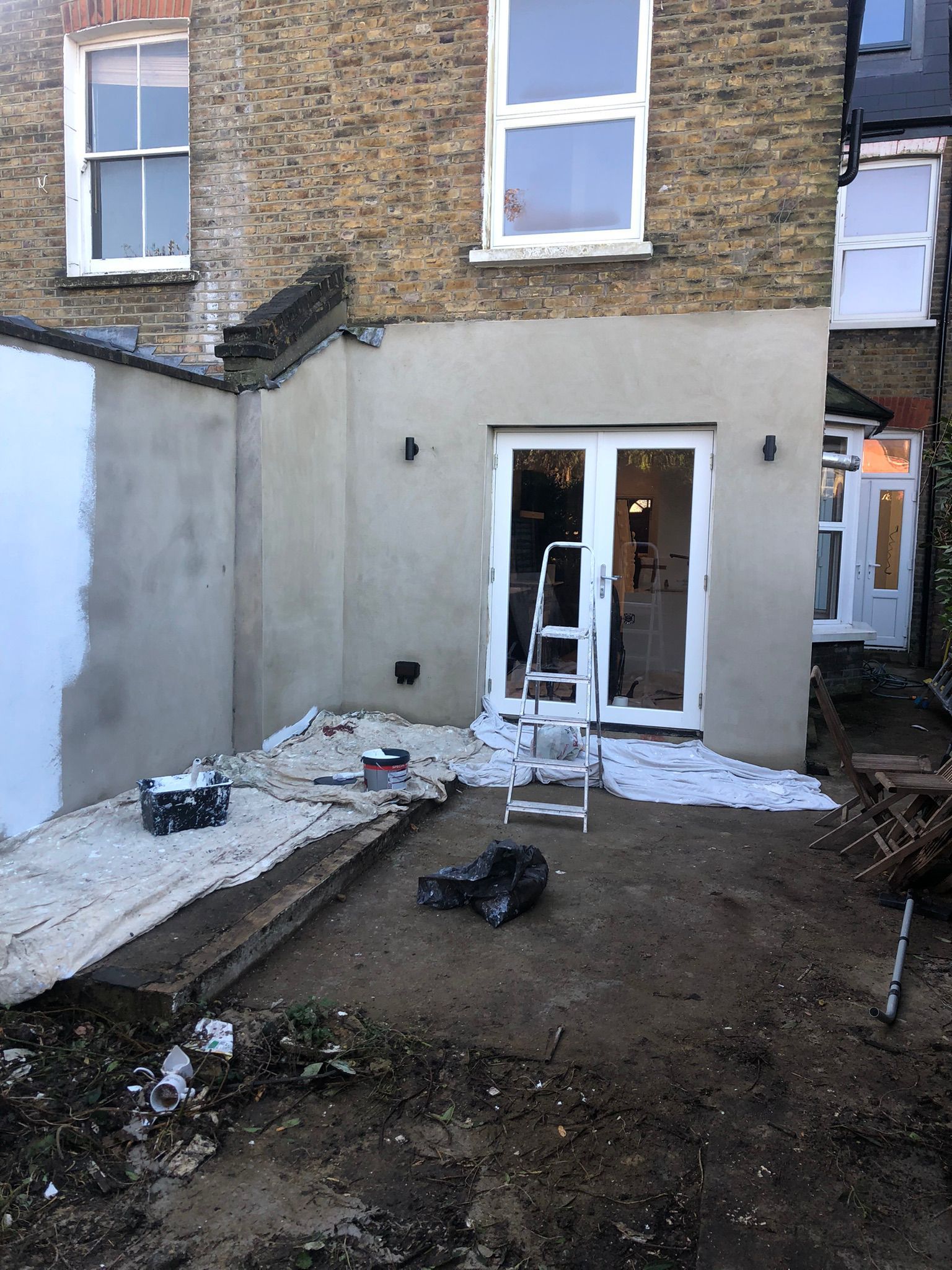 Before exterior plastering and painting work in Surrey.